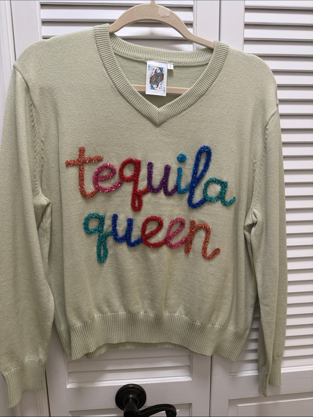 QUEEN OF SPARKLES Sage Green V-Neck Sweater with Multicolor Embellished Script